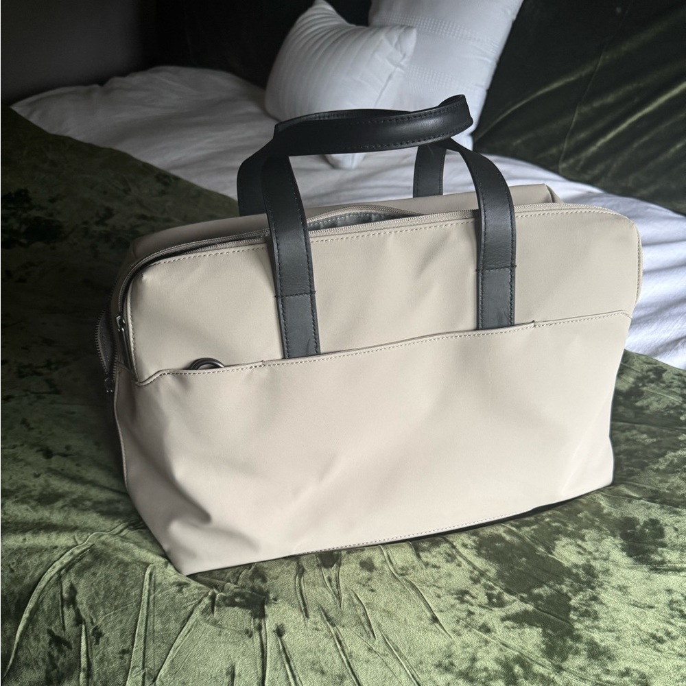 Away Beige and Black Duffel Bag